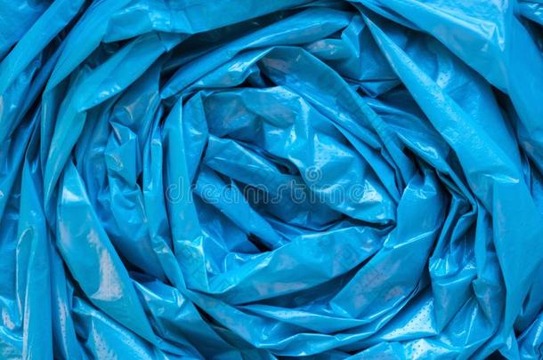 蓝色垃圾袋质地.玻璃纸反常的摺皱的塑料制品波黑