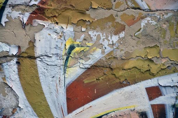 碎片关于一老的墙和富有色彩的在墙上的乱涂乱写绘画