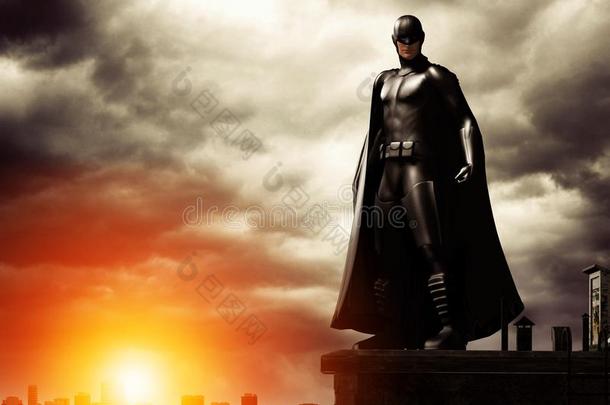 黑暗的超级英雄向屋顶忽视城市风光照片