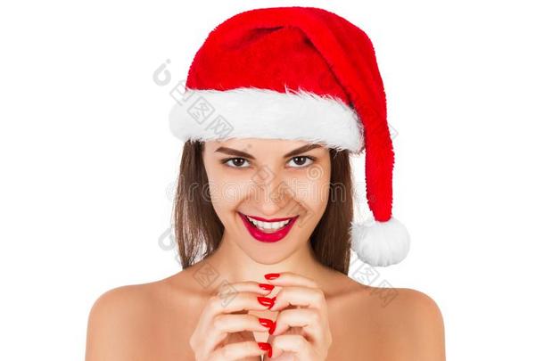 令人惊异的惊恐的青少年女人使摆姿势采用圣诞节帽子.表现强烈情感的沃玛