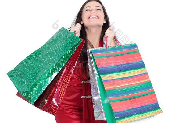 美丽的女人和购物袋为圣诞节购物.