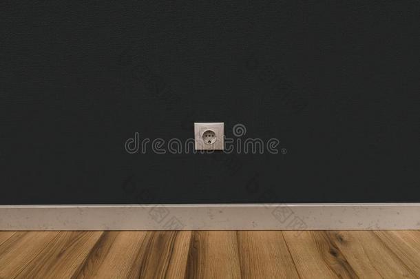 单一的动力插座采用黑暗的墙越过木制的地面