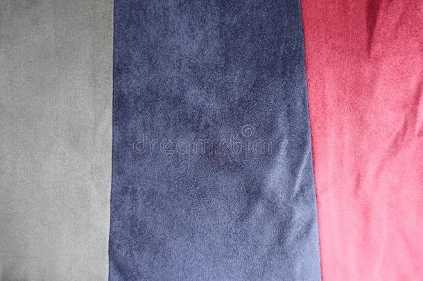 灰色的,蓝色和红色的垂直的条关于绒面革缝同时