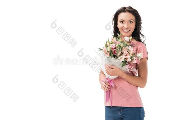肖像关于微笑的女人和花束关于花