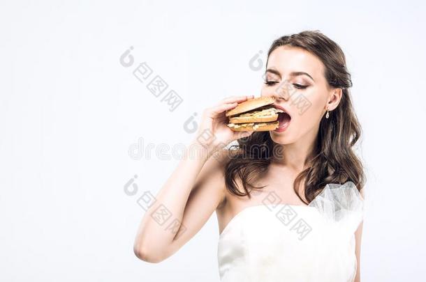 饥饿的年幼的新娘采用wedd采用g衣服eat采用g大的汉堡包