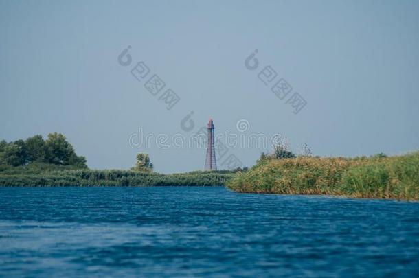 灯塔在指已提到的人黑的海,第聂伯河河口,乌克兰人园林景观