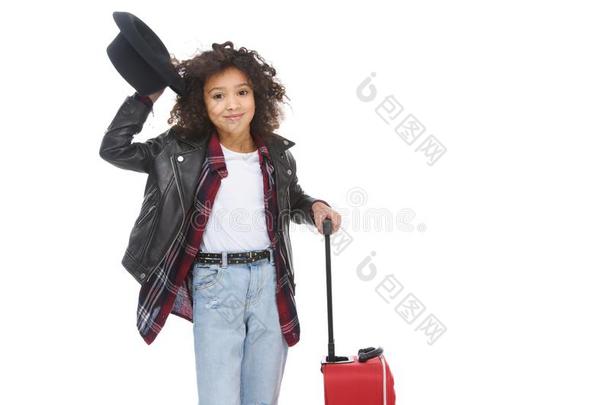 幸福的小的小孩采用时髦的cloth采用g和帽子和行李