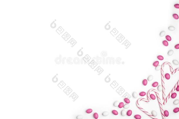 框架粉红色的和白色的c和ies和棒糖顶看法白色的后面