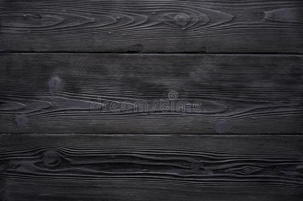 背景关于老的酿酒的黑的木制的板.强烈地穿旧的和