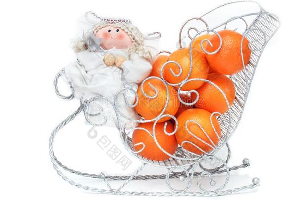 玩具漂亮的天使和橘子