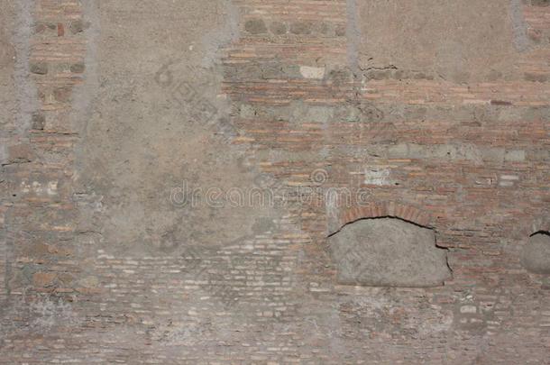 背景关于老的恶劣的砖墙和剥皮灰泥,质地