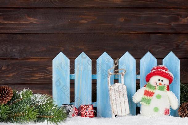 圣诞节雪人和雪橇玩具和冷杉树