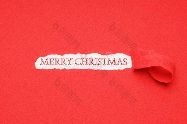 愉快的圣诞节招呼看见通过洞采用红色的纸后台