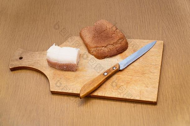 猪油,刀和吉卜赛绅士面包向锋利的板