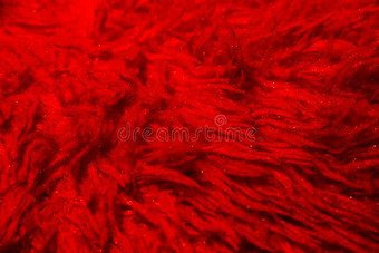 红色的暖和的毛茸茸的软的组织上的背景图片