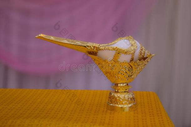 贝壳壳向金色的盘子为ThaiAirwaysInternational泰航国际婚礼.婚礼计划德泰