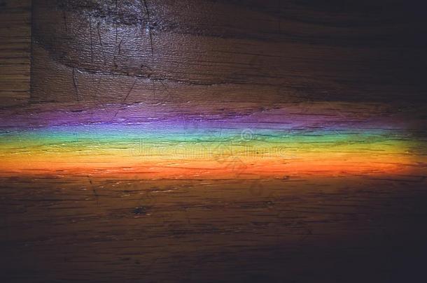 关在上面宏指令照片关于彩虹向木制的地面.