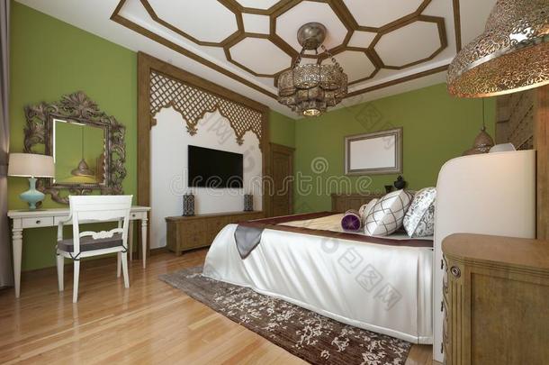 东卧室采用AmericanRioAdvertisingBureau美国无线电广告局方式,木制的床头板和绿色的墙.televisi