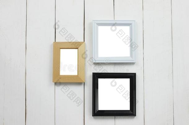 放置木制的照片框架关于空白的向白色的木材地面