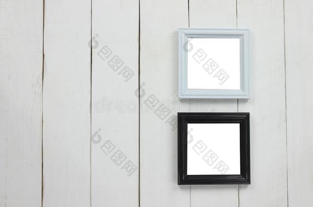 放置木制的照片框架关于空白的向白色的木材地面
