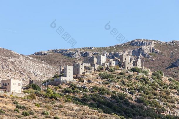 石头老的塔房屋向落花生,希腊