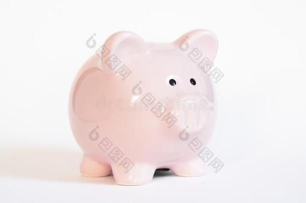 粉红色的陶器的小猪银行