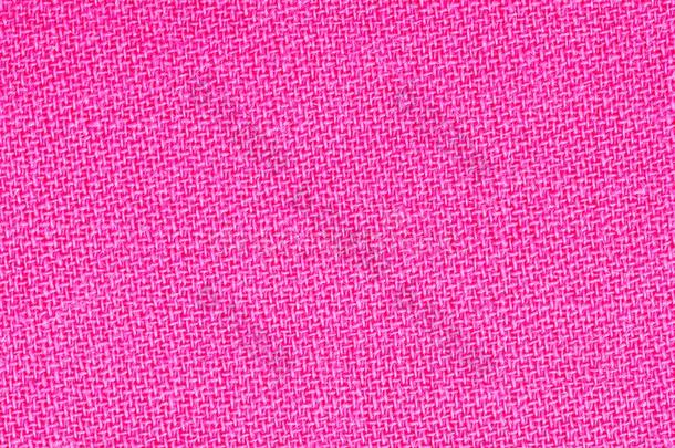 粉红色的织物背景质地.详述关于纺织品材料关