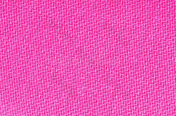 粉红色的织物背景质地.详述关于纺织品材料关