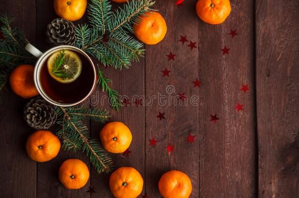 圣诞节新的年背景和橘子,茶水和糖果向
