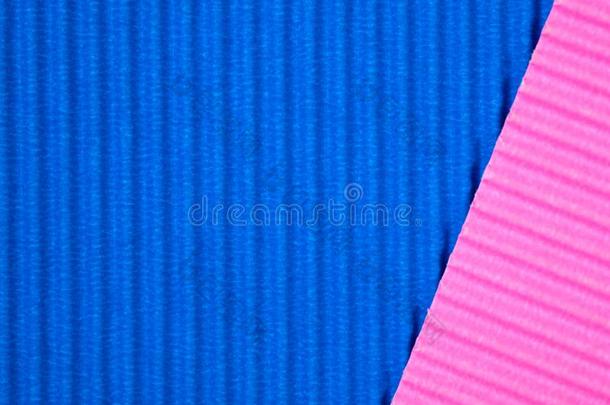 蓝色和粉红色的波纹的纸质地,使用为背景.活体解剖
