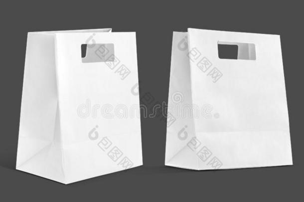 白色的购物纸袋隔离的向灰色背景