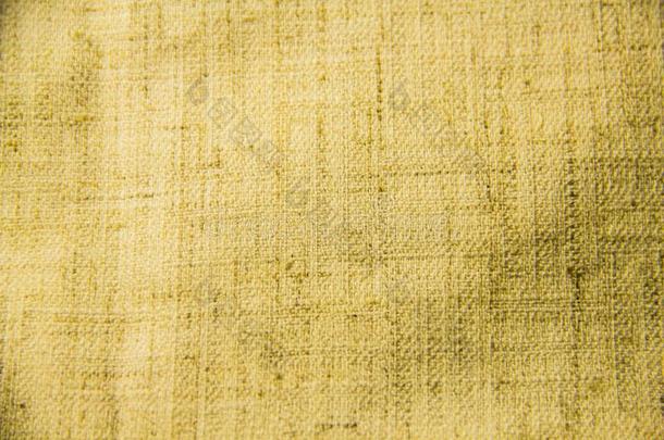 质地黄色的棕色的亚麻布织物特写镜头