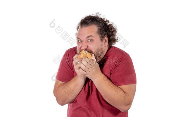 有趣的肥的男人吃汉堡包.快的食物,很不健康吃.太好了