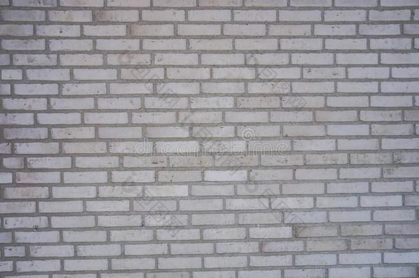 质地关于粗糙的灰色的砖赛跑者起跑时脚底所撑的木块具体的墙为背景
