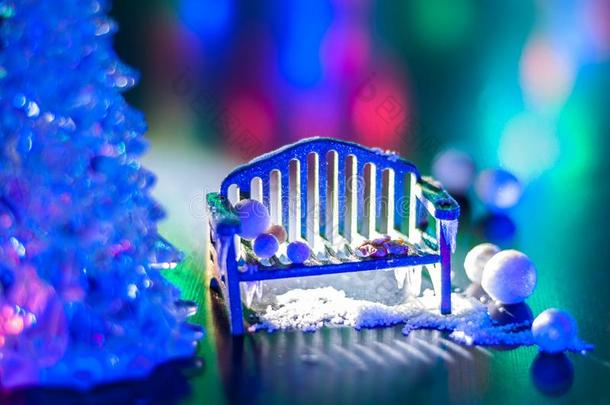 新的年,设计照片神秘的明亮的夜长凳,雪,露指手套