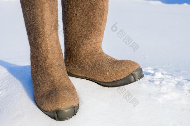 暖和<strong>的</strong>冬鞋子使关于毛毡关在上面采用指已提到<strong>的</strong>人<strong>雪</strong>.<strong>照片</strong>胜过