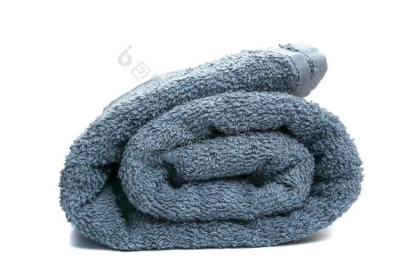 灰色毛巾布沐浴毛巾隔离的向白色的背景