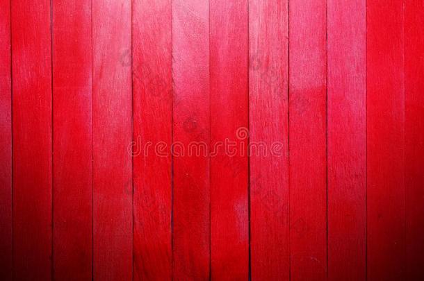 垂直的粗糙的红色的木制的划分墙质地背景