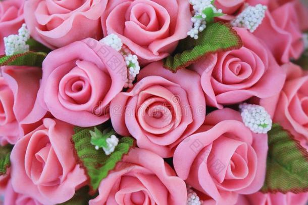 富有色彩的装饰的花小型的黏土粉红色的玫瑰质地,