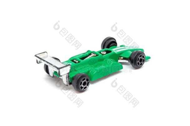 照片关于绿色的<strong>玩具模型</strong>汽车隔离的向白色的背景