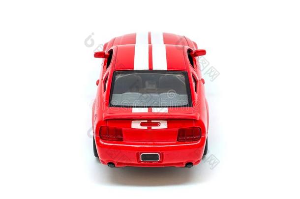 照片关于红色的玩具模型汽车隔离的向白色的背景