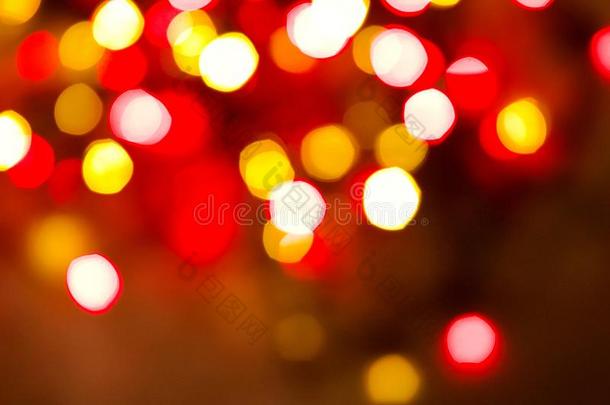 抽象的圆形的红色的和黄色的圣诞节家畜的肺脏向黑暗的后面