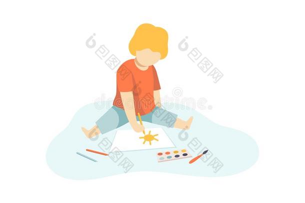 漂亮的男孩一次向地面和绘画和绘画颜料和铅笔向