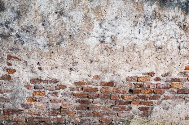 有裂缝的具体的酿酒的墙背景,老的砖墙