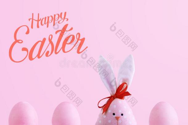 手工做的兔子经过复活节卵,观念关于庆祝和趺