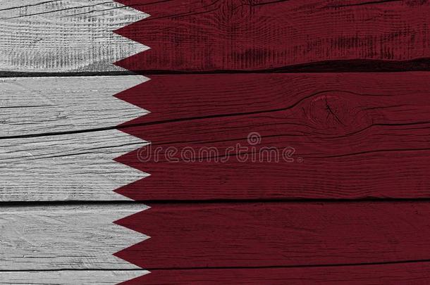 卡塔尔旗描画的向老的木材木板