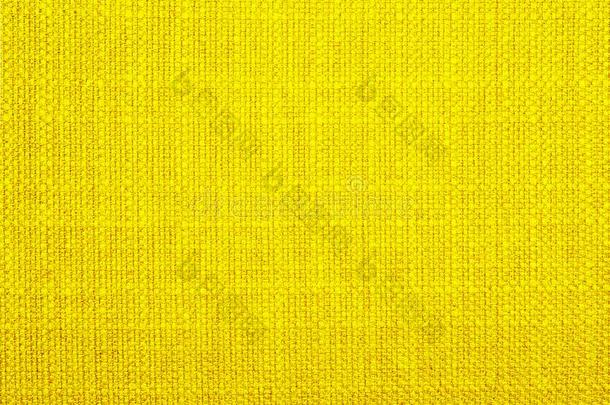 背景关于织地粗糙的黄色的自然的纺织品