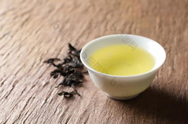 杯子关于是商行ductassuranceoperati向s产品保证有效期乌龙茶和茶水树叶向表