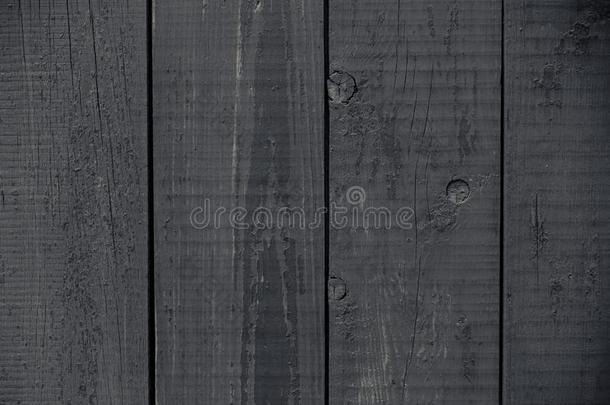 黑暗的灰色描画的乡村的栅栏.黑暗的灰色的木制的板质地.