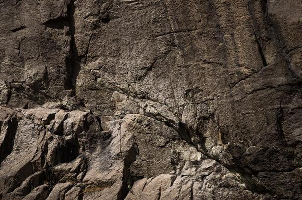 背景关于石头墙质地粗糙的岩石表面